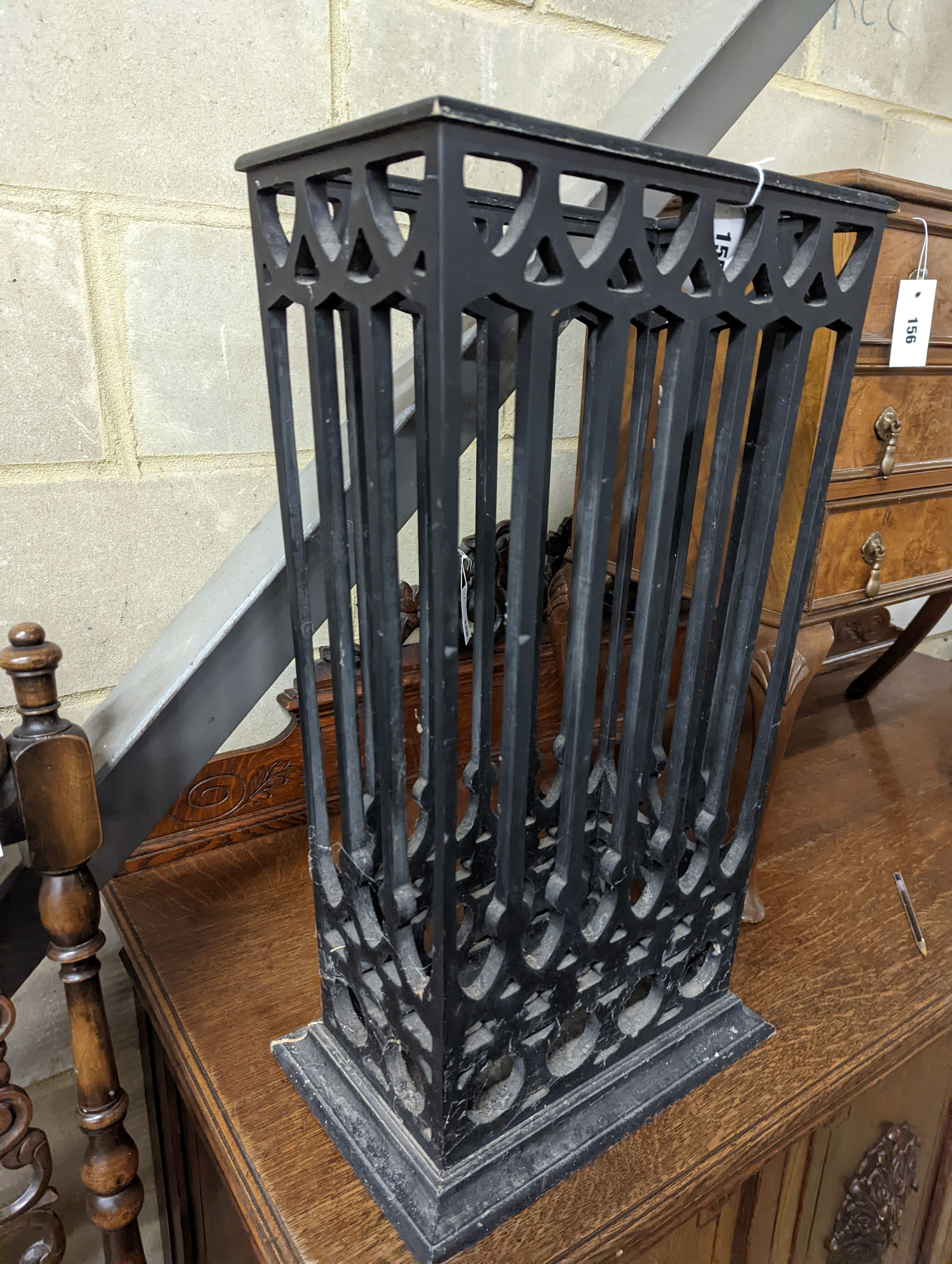 A painted gothic revival fretwork stick stand, width 36cm, depth 21cm, height 65cm